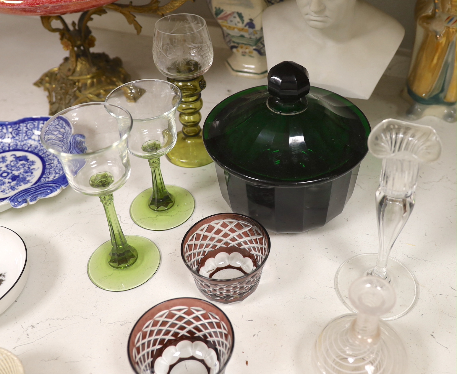 A French ruby lustre and ormolu mounted centrepiece, a green faceted glass bowl and cover, two Nymphenburg dishes, a pearlware dessert dish and other ceramics and glass